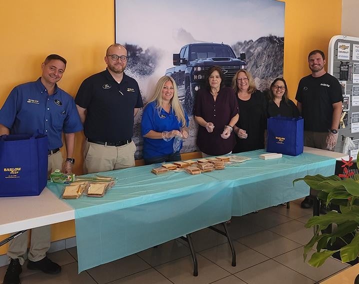 Group of volunteers making sandwiches
