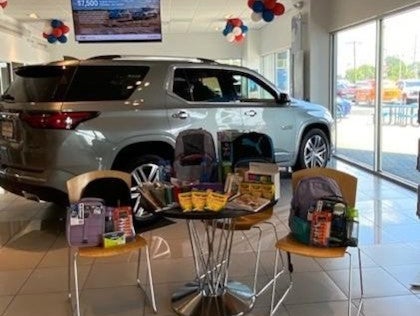 Car and chairs at fundraising event